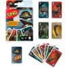 Opakowanie gry karcianej UNO Jurassic World z widocznymi kartami przedstawiającymi dinozaury oraz logo "UNO" i "Jurassic World". Na opakowaniu znajduje się tekst: "INCLUDES A SPECIAL RULE! INCLUT UNE RÈGLE SPÉCIALE! INCLUYE UNA REGLA ESPECIAL!" oraz oznaczenia "2-10", "7+" i "Mattel Games".