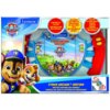 Opakowanie zabawki konsoli LEXIBOOK z motywem "Psi Patrol" zawiera kolorowe grafiki postaci z bajki oraz napisy: "Cyber Arcade Motion", "Control by tilting!", "50 games including 10 Paw Patrol!", "Racing, action, brain games!". Widoczne jest również logo "Lexibook" oraz ilustracja konsoli z przyciskami "Select" i "Start".