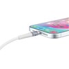 Na zdjęciu widać biały kabel USB Typ-C podłączony do smartfona z kolorowym ekranem, na którym widoczne są ikony aplikacji. Kabel ma przezroczystą końcówkę, a obudowa telefonu jest srebrna z widocznymi otworami głośnika.