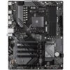 Czarna płyta główna z oznaczeniami "GIGABYTE" i "B550 EAGLE", posiada liczne złącza i komponenty elektroniczne, w tym gniazda RAM i PCIe. Widoczne są napisy takie jak "RISE TO THE TOP" oraz różne porty oznaczone jako USB3.2, USB3.1, USB2.0, AUDIO.