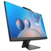 Na zdjęciu widoczny jest komputer typu all-in-one z ekranem wyświetlającym kolorowe bąbelki na niebieskim tle. Na ekranie znajduje się logo "ASUS".