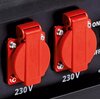 Zdjęcie przedstawia dwie czerwone gniazda elektryczne zamontowane na czarnej powierzchni, każde z nich oznaczone napisem "230 V". Obok gniazd widoczne są fragmenty napisów "ON" i "OFF".