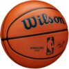 Pomarańczowa piłka koszykowa z widocznym logo "Wilson" oraz napisami "AUTHENTIC SERIES OUTDOOR" i "NBA". Na piłce znajduje się również sylwetka koszykarza oraz podpis "Adam Silver COMMISSIONER".