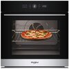 Czarny piekarnik elektryczny z wyświetlaczem cyfrowym pokazującym godzinę 12:00, wewnątrz którego znajduje się pizza na metalowej kratce. Na dolnej części piekarnika widoczne jest logo "Whirlpool".