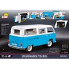Na zdjęciu znajduje się model plastikowych klocków przedstawiający niebiesko-biały Volkswagen Transporter T2b Bus w skali 1:12, z widocznymi szczegółami wnętrza i silnika. W lewym górnym rogu widnieje logo COBI, a poniżej znajdują się specyfikacje technic