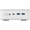 Biały panel przedni komputera z przyciskiem zasilania, gniazdem audio, portem USB-C oznaczonym jako "USB 3.2", oraz dwoma portami USB-A z niebieskim wnętrzem. Obok portów znajdują się małe ikony wskazujące ich funkcje.