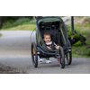 Przyczepka rowerowa HAMAX Outback One 34kg Pasy Zielono-czarny Rama Aluminiowa