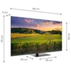 Telewizor z wyświetlaczem pokazującym krajobraz winnicy o zachodzie słońca, z wymiarami: szerokość 96 cm, wysokość 59 cm, głębokość 9 cm, a wysokość ekranu 56 cm i podstawa o głębokości 28 cm. Na dolnej ramce widoczne jest logo "THOMSON".
