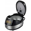 Multicooker TurboTronic TT-DMC22 z otwartą pokrywą, posiada panel sterowania z wyświetlaczem LED i przyciskami do wyboru programów. Na obudowie widoczne jest logo "TurboTronic".