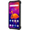 Smartfon z wyświetlaczem pokazującym kolorowy obraz flaminga oraz ikonami aplikacji takimi jak Weather, Meet, Assistant i Play Store. Na ekranie widoczna jest godzina 02:56 oraz data Tuesday, May 16, a na boku obudowy napis "WATERPROOF".