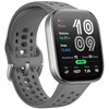Szary smartwatch z prostokątnym wyświetlaczem pokazuje różne dane, takie jak: 85 BPM, Distance 16.07 KM, Steps 12,003, Readiness 92, Stand 03, Reps, 75% naładowania, HRV 47, Kcal 1027, Sleep 7.2h, PAI 55. Pasek zegarka ma perforacje, a na ekranie widoczna