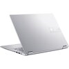Srebrny laptop z widocznym logo "ASUS VivoBook" na pokrywie, z kilkoma portami po jednej stronie. Laptop jest częściowo otwarty, ukazując klawiaturę i zawiasy.