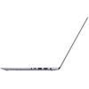 Na zdjęciu widoczny jest srebrny laptop w pozycji półotwartej, ukazujący boczny profil z widocznymi portami. Laptop ma smukłą konstrukcję i minimalistyczny design.