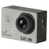 Kamera sportowa w srebrnym kolorze z dużym obiektywem, przyciskiem z napisem "mode" oraz oznaczeniami "WiFi SJ5000X" i "SJCAM". Na boku widoczne są porty USB i HDMI.