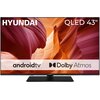 Telewizor z widocznym logo "HYUNDAI" oraz napisem "QLED 43"", z wyświetlanym obrazem przedstawiającym kolorowe formacje skalne. Na ekranie znajdują się również napisy: "android tv" i "Dolby Atmos".