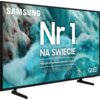 Telewizor z wyświetlaczem prezentującym obraz w odcieniach turkusu i bieli, z dużym napisem "Nr 1 NA ŚWIECIE" oraz mniejszym tekstem "Najczęściej kupowane telewizory od 19 lat". Widoczne logo "SAMSUNG" i oznaczenie "QLED".
