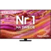 Na zdjęciu widoczny jest telewizor z kolorowym, abstrakcyjnym tłem w odcieniach różu i pomarańczu. Na ekranie znajduje się tekst: "SAMSUNG Nr 1 NA ŚWIECIE Najczęściej kupowane telewizory od 19 lat" oraz "Neo QLED".
