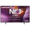 Na zdjęciu widoczny jest telewizor z wyświetlonym kolorowym tłem w odcieniach fioletu i pomarańczu oraz tekstem: "SAMSUNG Nr 1 NA ŚWIECIE Najczęściej kupowane telewizory od 19 lat". W dolnym rogu znajduje się napis "OLED".
