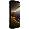 Przedstawiony jest smartfon z dużym ekranem, na którym widoczna jest abstrakcyjna grafika w odcieniach złota i brązu. Obudowa urządzenia ma solidny wygląd z metalicznymi elementami po bokach.