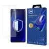 Opakowanie produktu "3mk FlexibleGlass Pro" przedstawia grafikę telefonu z nałożonym szkłem ochronnym oraz dużą ikoną tarczy na ekranie. Na opakowaniu widnieje tekst: "FlexibleGlass Pro™ Feel the power", a także ikony i napisy: "Unbreakable Glass", "Certificates & Awards", "PZH", "ROHS", "must have", "Tested by J.S. Hamilton Laboratories".