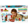 Pudełko zestawu LEGO 10456 DUPLO przedstawia dziecko bawiące się klockami, w tym czerwonym samochodem i elementami warsztatu. Na opakowaniu widoczne są logotypy LEGO, DUPLO oraz Disney Pixar Cars, a także napisy takie jak "IMAGINATION AND CREATIVITY", "LO