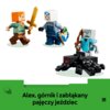 Na zdjęciu znajdują się trzy figurki z klocków, przedstawiające postacie z gry, oraz czarny pająk z czerwonymi oczami. Na dole zdjęcia widnieje tekst: "Alex, górnik i zabłąkany pajęczy jeździec".