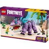 Pudełko zestawu LEGO przedstawia fioletowego stwora z dużymi zębami i niebieskimi kolcami na grzbiecie, otoczonego przez dwie figurki postaci z gry Fortnite. Na opakowaniu widnieje napis "LEGO FORTNITE", a także informacje: "10+", "77077", "Klombo", "1084