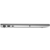 Srebrny laptop widziany z boku, z widocznymi portami: USB, HDMI, USB-C oraz gniazdem audio. Na obudowie znajduje się napis "media expert".