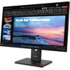 Monitor marki Lenovo wyświetla prezentację z tytułem "Tech for Tomorrow" na tle krajobrazu z morzem i zachodem słońca. Na ekranie widoczne są także miniatury slajdów oraz pasek narzędziowy programu do tworzenia prezentacji.