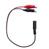 Zdjęcie przedstawia kabel z dwoma krokodylkami, jednym czerwonym i jednym czarnym, oraz złączem na drugim końcu. Kabel jest ułożony na białym tle.