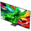 Duży telewizor z cienką ramką wyświetla kolorową grafikę z dynamicznymi, abstrakcyjnymi kształtami w odcieniach zieleni, niebieskiego, czerwieni i żółci. Ekran jest umieszczony na prostokątnej podstawie.