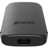 Czarny adapter z napisem "Carlinkit" na górnej powierzchni, z widocznym portem na jednym z końców. Produkt ma zaokrąglone krawędzie i gładką powierzchnię.
