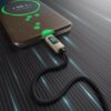 Na zdjęciu widać czarny kabel USB-C podłączony do smartfona, z wyświetlaczem LCD na wtyczce pokazującym "100W". Na ekranie telefonu widoczny jest napis "98.1% Super charging" oraz data "Wed, Apr 21".