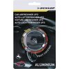Na zdjęciu znajduje się opakowanie odświeżacza do samochodu marki Dunlop z napisem "CAR AIRFRESHNER UFO" w kilku językach oraz "FRUIT COCKTAIL" i "ALUMINIUM". Widoczne jest również logo Dunlop oraz ilustracja przedstawiająca produkt.