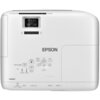 Biały projektor z widocznym logo "EPSON" na górnej powierzchni, posiada przyciski sterujące oznaczone jako Home, Menu, H/V, Esc oraz wskaźniki Status, Lamp, Temp. Na obudowie znajdują się złącza USB-A, USB-B, Audio Out, HDMI 1 i HDMI 2, a także napisy A/V