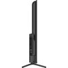 Czarny telewizor widziany z boku, z widocznymi portami z tyłu obudowy oraz podstawą w kształcie litery V. Na obudowie znajdują się porty HDMI, USB oraz inne złącza.