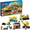 Pudełko zestawu LEGO 60391 City przedstawia scenę budowy z ciężarówkami i dźwigiem z kulą wyburzeniową, a na opakowaniu widnieje logo LEGO oraz oznaczenie wiekowe 4+. Na zdjęciu znajdują się także złożone modele pojazdów i budynków z zestawu oraz figurki 