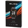 Czarny smartwatch z wyświetlaczem pokazującym godzinę 10:09 oraz wskaźniki: 102 BPM, 98% i 16358 kroków. Na ekranie widoczne są także elementy graficzne w postaci siatki oraz pomarańczowe łuki i ikony.