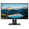 Monitor z cienkimi ramkami wyświetla obraz przedstawiający górski krajobraz z jeziorem, otoczony lasami i ośnieżonymi szczytami. Na podstawie monitora widoczne jest logo "Lenovo".