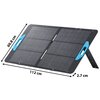 Na zdjęciu znajduje się panel fotowoltaiczny z niebieskimi uchwytami, ustawiony pod kątem na podpórce. Wymiary panelu to 60,8 cm na 112 cm na 2,7 cm.