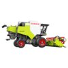 Model plastikowego kombajnu zdalnie sterowanego, z widocznym napisem "CLAAS" na białej części oraz "370 DOMINATOR" na zielonej części. Kombajn ma czerwone koła i szczegółowe elementy konstrukcyjne, w tym przystawkę do zbioru z przodu.