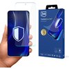 Na zdjęciu widoczny jest telefon z nałożonym szkłem ochronnym, na ekranie którego znajduje się grafika tarczy. Obok telefonu znajduje się opakowanie produktu z napisem "3mk FlexibleGlass Pro™ Feel the power", a także ikonami certyfikatów i oznaczeniami ja