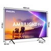 Telewizor marki PHILIPS z napisem "AMBILIGHT tv QLED" na ekranie, przedstawiającym sylwetki jeźdźców na tle zachodu słońca. Wymiary telewizora to 122,6 cm szerokości, 77,8 cm wysokości, 71,5 cm wysokości ekranu oraz głębokość podstawy 28 cm i 8,8 cm.