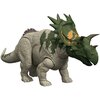 Na zdjęciu znajduje się figurka dinozaura z serii Jurassic World, przedstawiająca Spiclypeusa. Figurka ma zielono-szare ubarwienie z żółtymi akcentami na głowie i charakterystycznymi rogami.