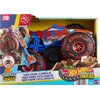 Pudełko z zabawką przedstawia zdalnie sterowany samochód Hot Wheels Monster Trucks w kształcie rekina, z dużymi kołami i kolorowym wzorem. Na opakowaniu widnieją napisy: "Hot Wheels Monster Trucks", "Tiger Shark Climber RC", "Sharks vs Dinos", oraz "Grip 