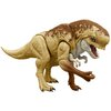 Przedstawiona jest figurka dinozaura o brązowo-beżowym ubarwieniu, z otwartą paszczą i widocznymi zębami. Figurka ma szczegółowo odwzorowaną teksturę skóry oraz ruchome kończyny.