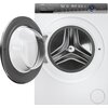 Pralka o białej obudowie z otwartymi drzwiami, ukazująca wnętrze bębna. Na panelu sterowania widoczne są napisy: "Haier", "Direct motion", "Auto Clean", "Auto", oraz różne ikony programów prania.