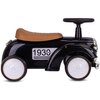 Czarny jeździk w stylu retro z brązowym siedzeniem, białymi kołami i napisem "1930 CLASSIC" na boku. Produkt ma kierownicę i chromowane detale z przodu.