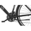 Czarno-szary rower trekkingowy z widocznym mechanizmem korbowym, pedałem i częścią tylnego koła z oponą o białym pasku. Na ramie znajduje się fragment napisu "INDIANA".