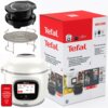 Na zdjęciu znajduje się multicooker Tefal z wyświetlaczem dotykowym, metalowy ruszt oraz opakowanie z logo Tefal i napisem "COOK4ME TOUCH PRO". Na ekranie urządzenia widoczny jest tekst: "Co dziś ugotujemy", a obok znajduje się czerwony znak z napisem "TY